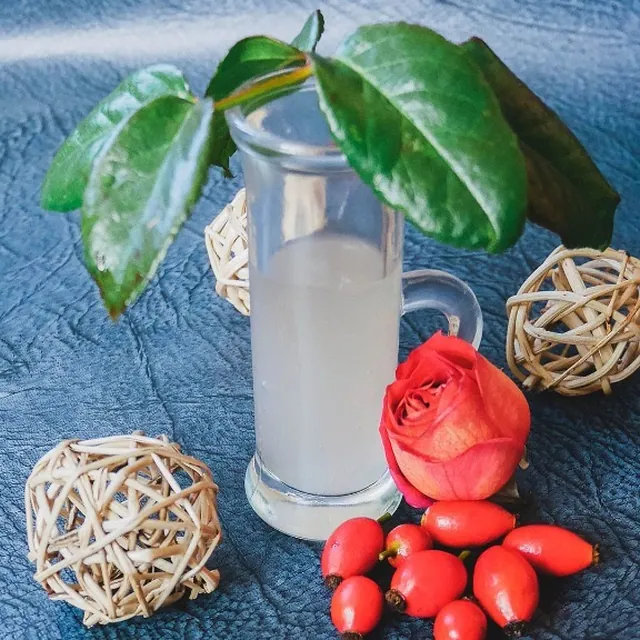 Bottle of botanical face serum with rose extract