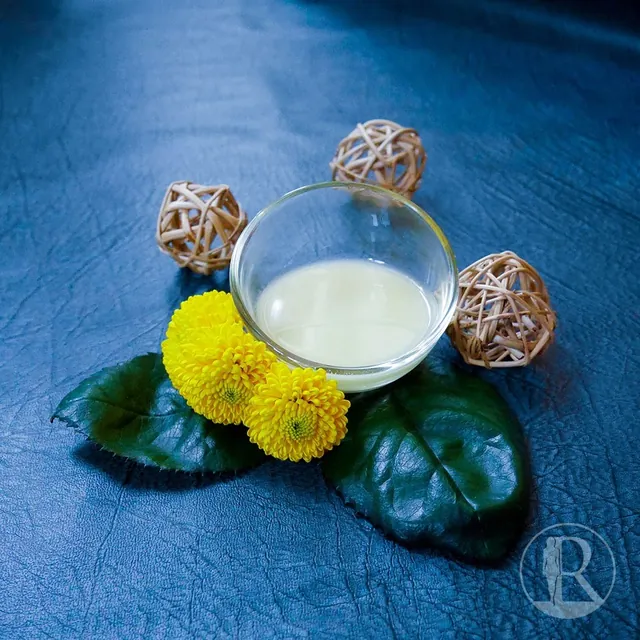 Jar of night cream with chrysanthemum